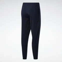 Reebok Pantalón Training Essentials Woven Cuffed -Regattas Tienda pantalon training essentials woven cuffed 2