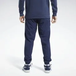 Reebok Pantalón Training Essentials Woven Cuffed -Regattas Tienda pantalon training essentials woven cuffed 4